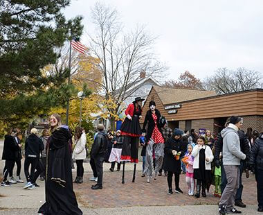 People dressed in costume for Halloween at Kenwood Park