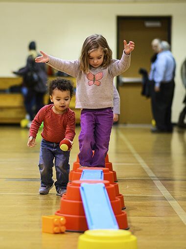 Children Using Parent-Tot Indoor Playground