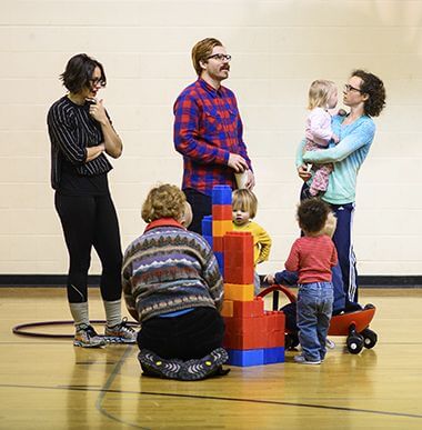 Families with Building Blocks at Parent-Tot Indoor Playground