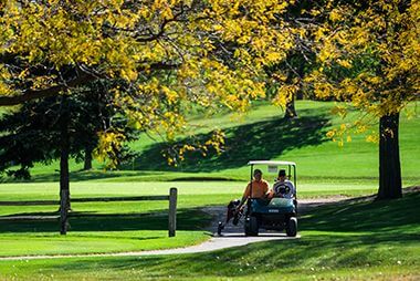 Theodore Wirth Golf Club Players Riding Golf Carts