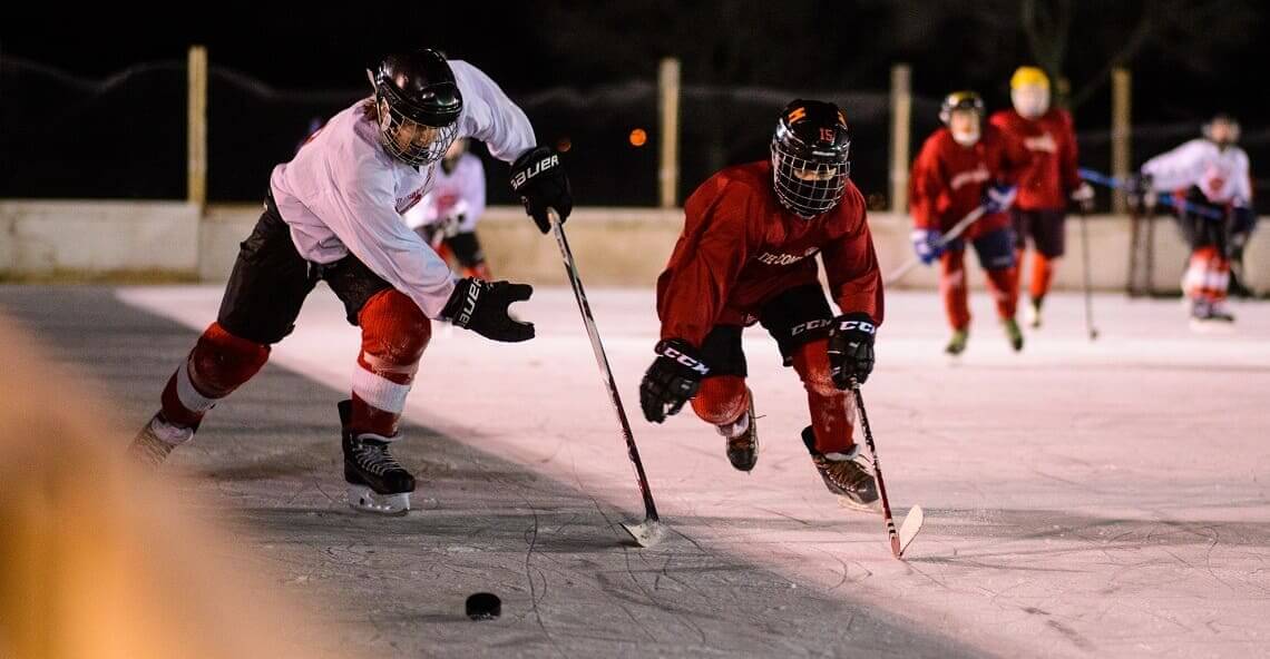 Outdoor youth hockey game at Pearl Park