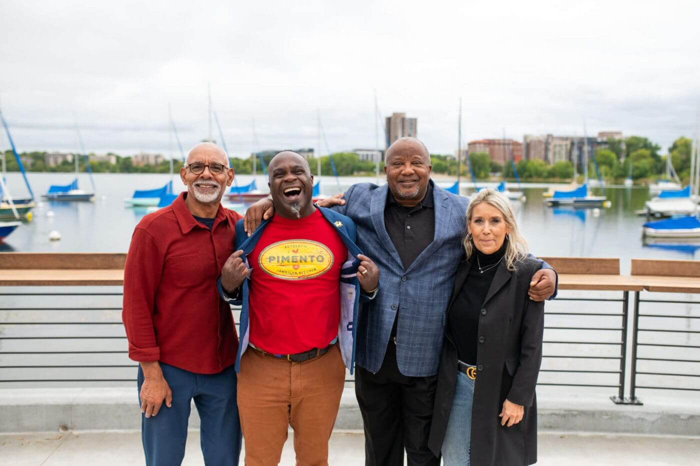 Four members from the Pimento on the Lake team pose for a photo at the Bde Maka Ska Paviilion