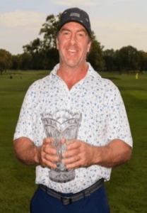 Chris Brogan holding a trophy