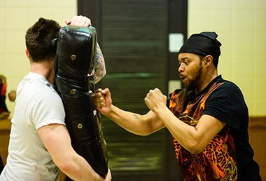 Kung Fu Class Participant Punching Bag