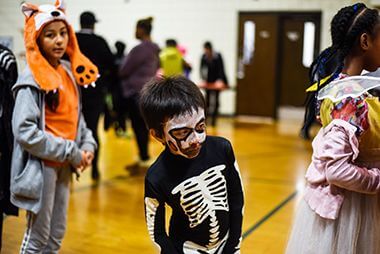 Child Dressed as Skeleton at North Commons Halloween Celebration