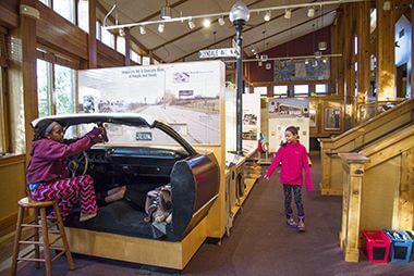 Visitors Exploring Indoor Exhibits at Carl W. Kroening Center