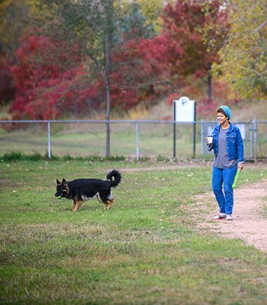 Owner and Dog at Victory Prairie Off-Leash Dog Park