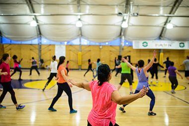people participating in a zumba class
