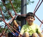 banner image: kids on playground equipment at Brackett Park