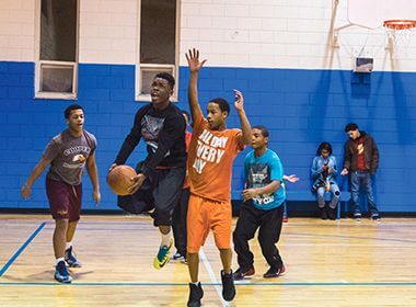 Youth Program Participants Playing Basketball
