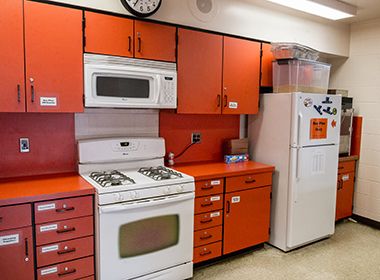 Community Kitchen Stove and Refrigerator