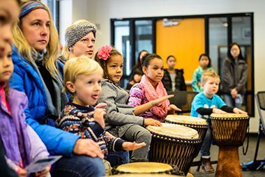 Kids Playing Drums at Powderhorn MLK Day Event