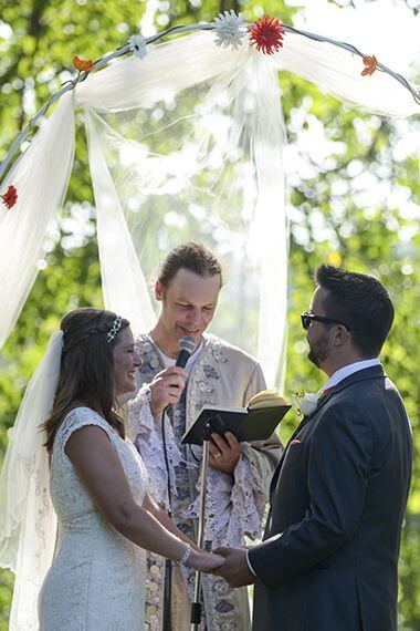 Bride and Groom Exchanging Vows at Gluek Park