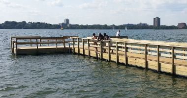 Group of fisherman on pier