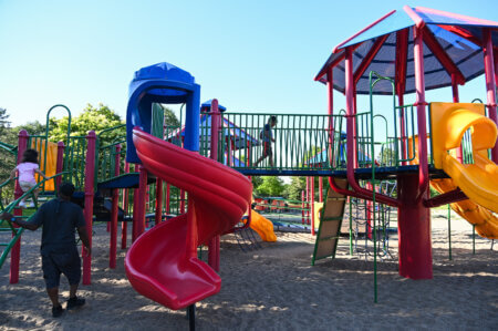 Children play on the Harrison Park playground.