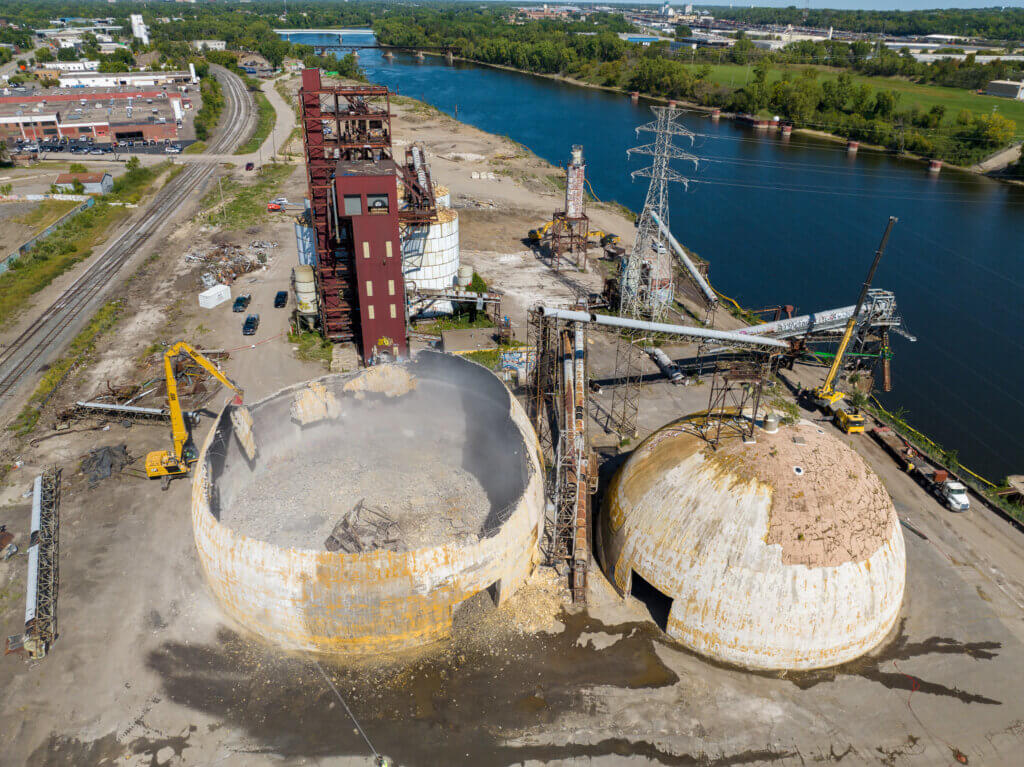 A rounded dome is demolished at the industrial Upper Harbor site, photo taken from above by drone